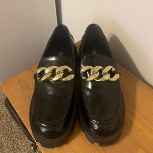 Black chunky patent loafers